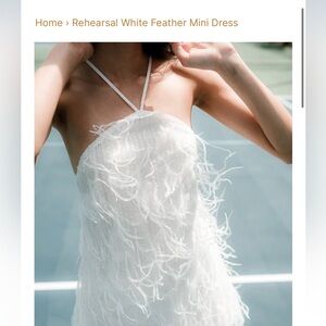 Elliatt Rehearsal Dress- new, never worn. Size small. Selling for $495 on site